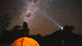 The night sky filled with bright stars over Australia's only Dark Sky Park in the Warrumbungles.