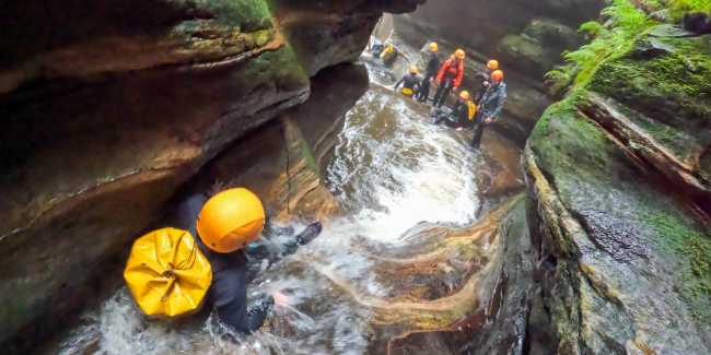 Sliding is one of the many thrills in Empress Falls Canyon