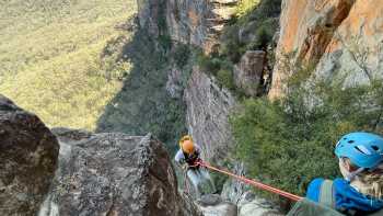 The Blue Mountains offer a stunning backdrop for an abseiling adventure, The Blue Mountains offer a stunning backdrop for an abseiling adventure